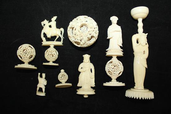 A Chinese export ivory puzzle ball and stand and four similar ivory chess pieces, 19th / early 20th century, 6.5cm - 21cm